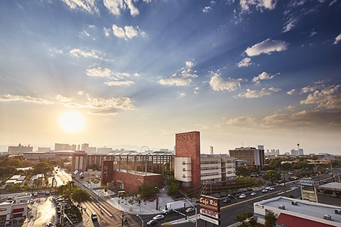 View of campus during sunset with the Las Vegas strip in the background